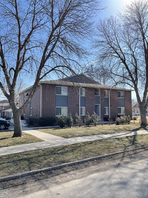 Columbus Junction apartment for rent - an apartment building with trees in front of it