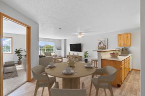 Rogers apartment for rent - Kitchen, dining, and living room at The Preserve at Commerce, Rogers, MN, 55374