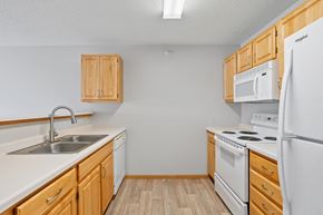 Rogers apartment for rent - Kitchen at The Preserve at Commerce, Rogers, MN, 55374