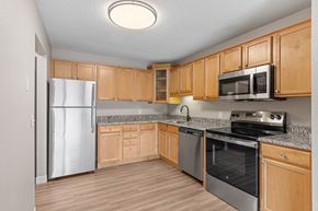 St. Louis Park apartment for rent - A kitchen in a newly renovated apartment home at Park Pointe Apartments in St. Louis Park, MN 55426