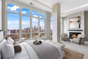 Minneapolis townhouse for rent - a bedroom with a bed and a view of a city at Expo, Minnesota