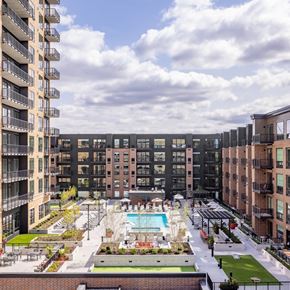 Minneapolis townhouse for rent - an aerial view of an apartment complex with a swimming pool at Expo, Minneapolis, 55414