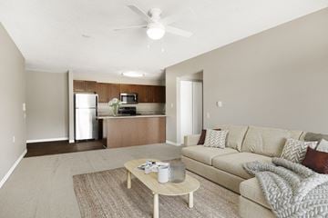 Savage apartment for rent - a living room with a couch and a coffee table
