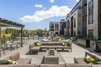 Outdoor patio with grilling stations and lounge