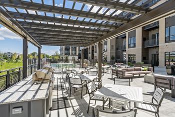 Outdoor grill with intimate seating area