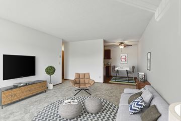 Maplewood apartment for rent - a living room with a couch and a tv