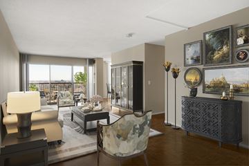 Edina apartment for rent - a living room filled with furniture and a balcony