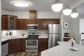 St. Louis Park apartment for rent - Kitchen with island and appliances at The Gables at Park Pointe, St. Louis Park, Minnesota