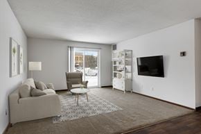 St. Paul apartment for rent - Living Room With TV at The Kendrick, St. Paul, Minnesota