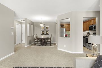 Lilydale apartment for rent - a living room with a dining room table and a kitchen