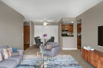 Apple Valley apartment for rent - a living room and dining room with a couch and a table