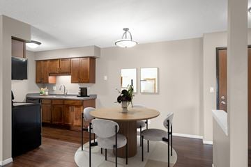 Plymouth apartment for rent - A kitchen with a table and chairs.