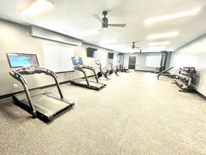 Lafayette apartment for rent - a large fitness room with treadmills and other exercise equipment at Murdock Gardens Apartments, Lafayette, IN 47904