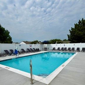 Lafayette triplex for rent - A pool with a person in a blue jacket standing by it.