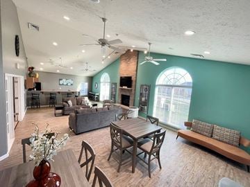 Lafayette triplex for rent - a living room and dining room with a table and chairs