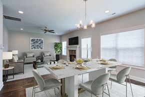 Knoxville townhouse for rent - A dining room with a white table and chairs.