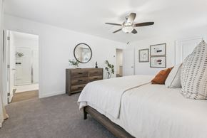 Douglasville townhouse for rent - Inviting bedroom with neutral tones and stylish furnishings