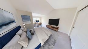 Greenfield apartment for rent - a bedroom with a bed and a tv