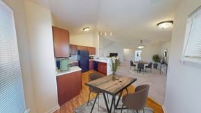 Greenfield apartment for rent - a kitchen and dining room with a table and chairs