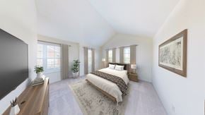 Brookfield townhouse for rent - A bedroom with a large bed and a flat screen TV.
