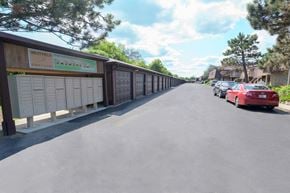 Greenfield apartment for rent - a long wall of lockers on the side of a street