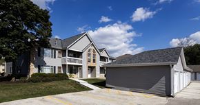 Waukesha apartment for rent - a row of houses with a blue sky in the background