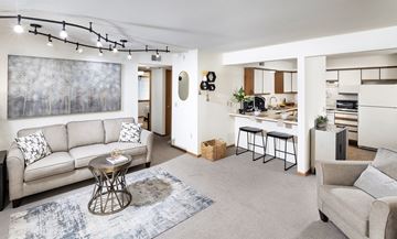 Waukesha apartment for rent - a living room with a couch and a table