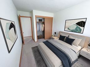 West Allis apartment for rent - a bedroom with a bed and a closet