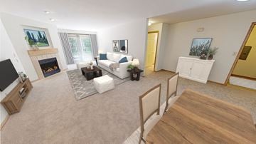 Oak Creek apartment for rent - A living room with a fireplace and a painting on the wall.