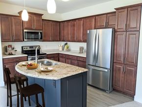 Brookfield apartment for rent - a kitchen with stainless steel appliances and a granite counter top