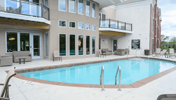 Swimming pool in front of a building