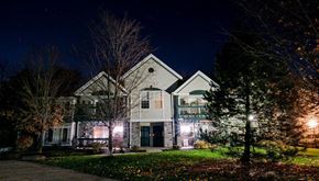 Hales Corners apartment for rent - a house is lit up at night