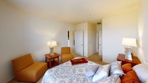 Brookfield apartment for rent - a bedroom with a bed and two chairs