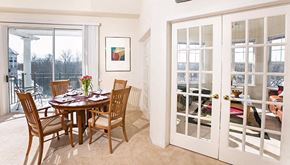 Brookfield apartment for rent - a dining room with french doors leading to a balcony