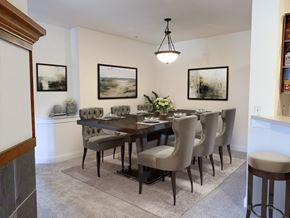 Greenfield apartment for rent - a dining room with a table and chairs