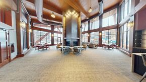Brookfield apartment for rent - A large open room with a fireplace and lots of windows.
