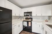 Canandaigua apartment for rent - Kitchen With White Cabinets at CenterPointe Apartments & Townhomes, New York, 14424