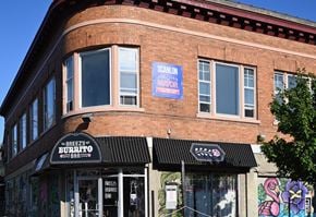 Buffalo apartment for rent - A building with a sign that says Breezy Burrito.