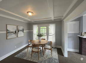 North Buffalo apartment for rent - A dining room with a table and chairs.