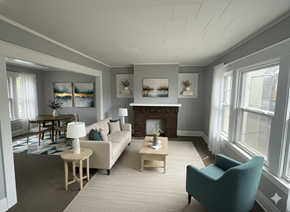 North Buffalo apartment for rent - A living room with a fireplace, a couch, a chair, and a dining table.