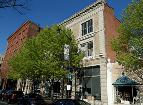 Buffalo apartment for rent - A street view of a building with a sign that says "CONSULT".