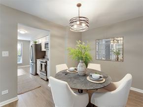 Glenview apartment for rent - A modern dining room with a round table set for two.
