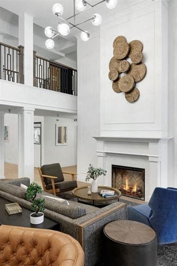 Plymouth apartment for rent - a living room with a fireplace and furniture