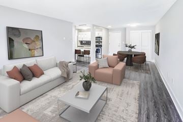 West Hartford apartment for rent - A modern living room with a white couch and a grey coffee table.