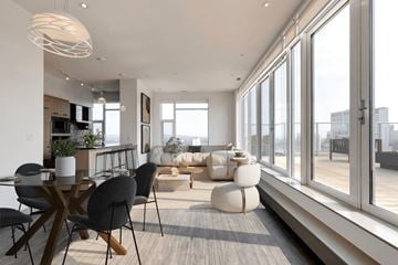 Calgary apartment for rent - A modern living room with a dining table and chairs.