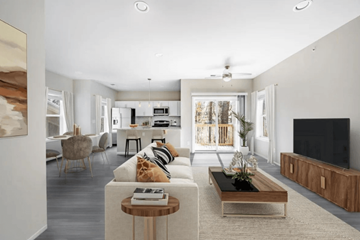 Nashville apartment for rent - A modern living room with a television and a coffee table.