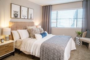 Peachtree Corners apartment for rent - the preserve at ballantyne commons apartments bedroom with bed and window