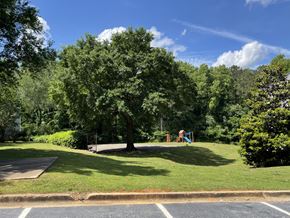 Decatur townhouse for rent - a park with a playground and trees