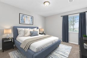 Decatur townhouse for rent - the preserve at ballantyne commons apartments bedroom with bed