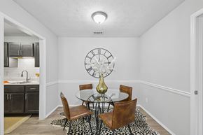 Duluth apartment for rent - A dining room with a table set for four.